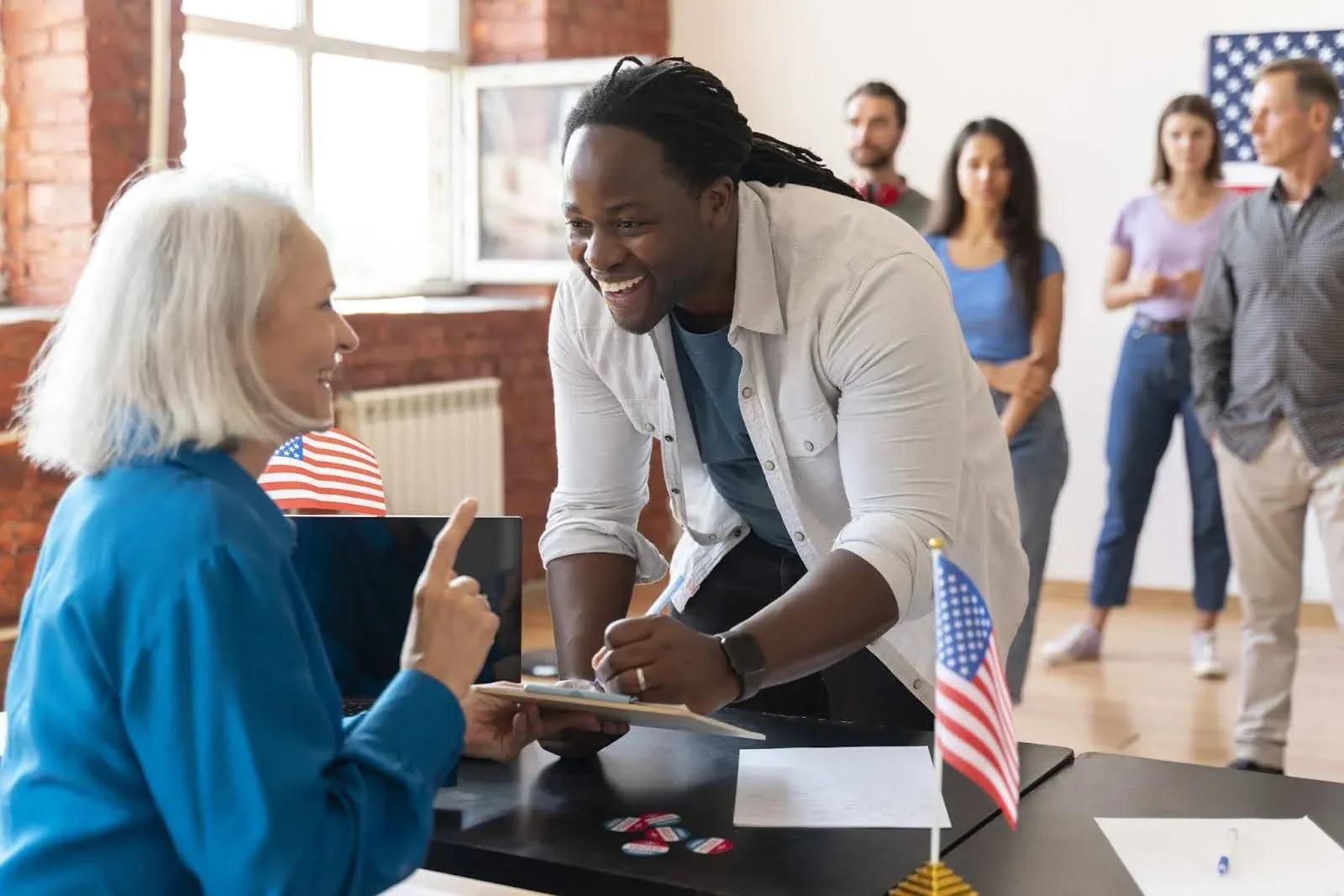 A doctor discussing health insurance with an old lady.webp