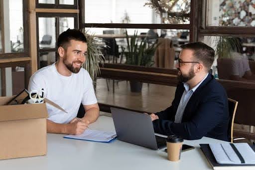 Insurance broker listening to client’s insurance needs before recommending plans.jpg