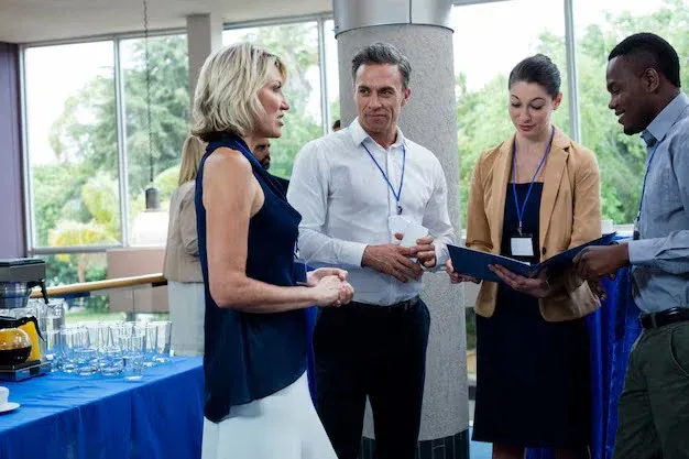 Three people discussing health insurance.webp