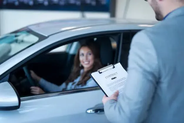 auto insurance broker providing contract to happy client.webp