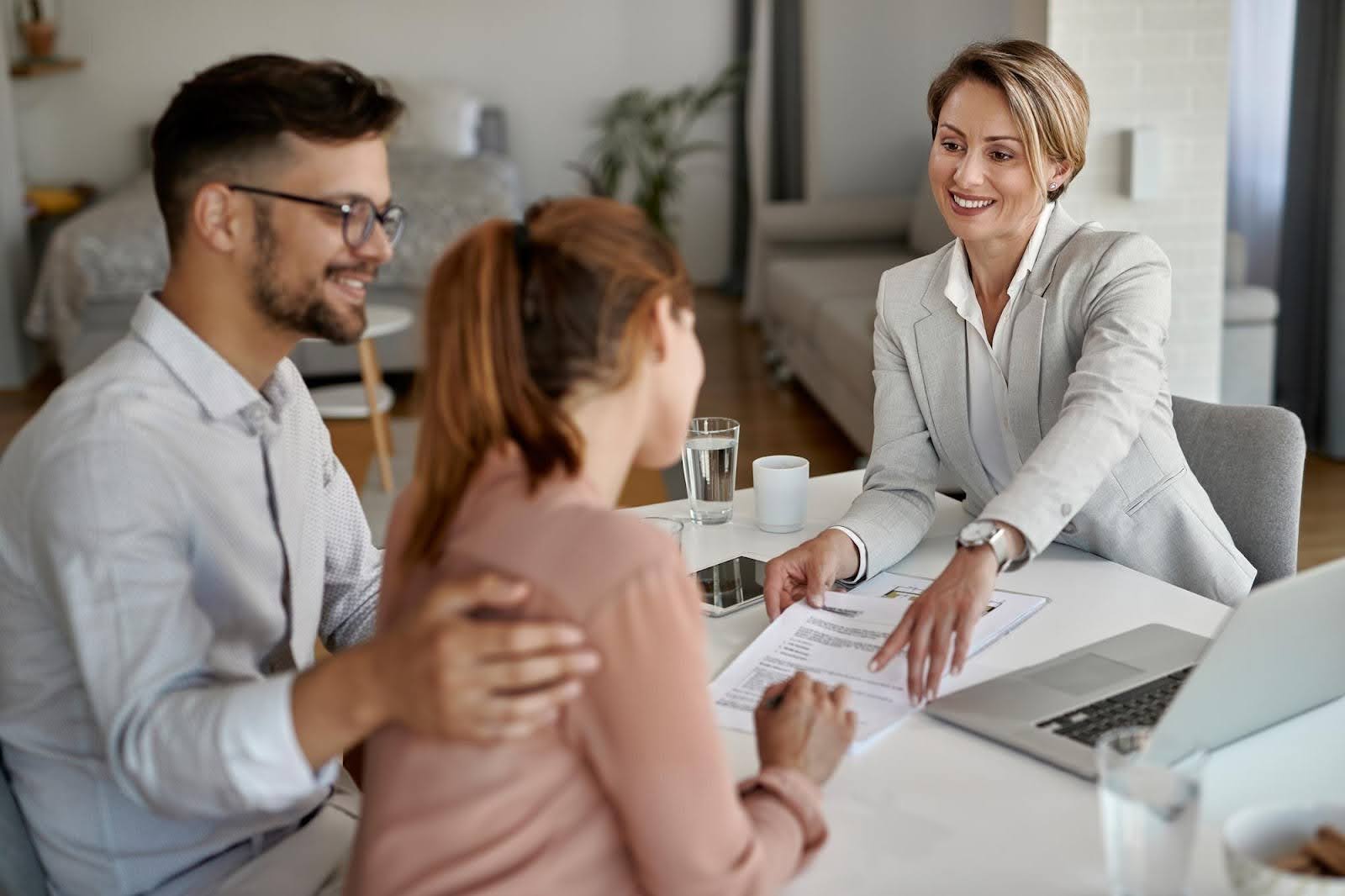 brokers helping a girl select the right life insurance.jpg