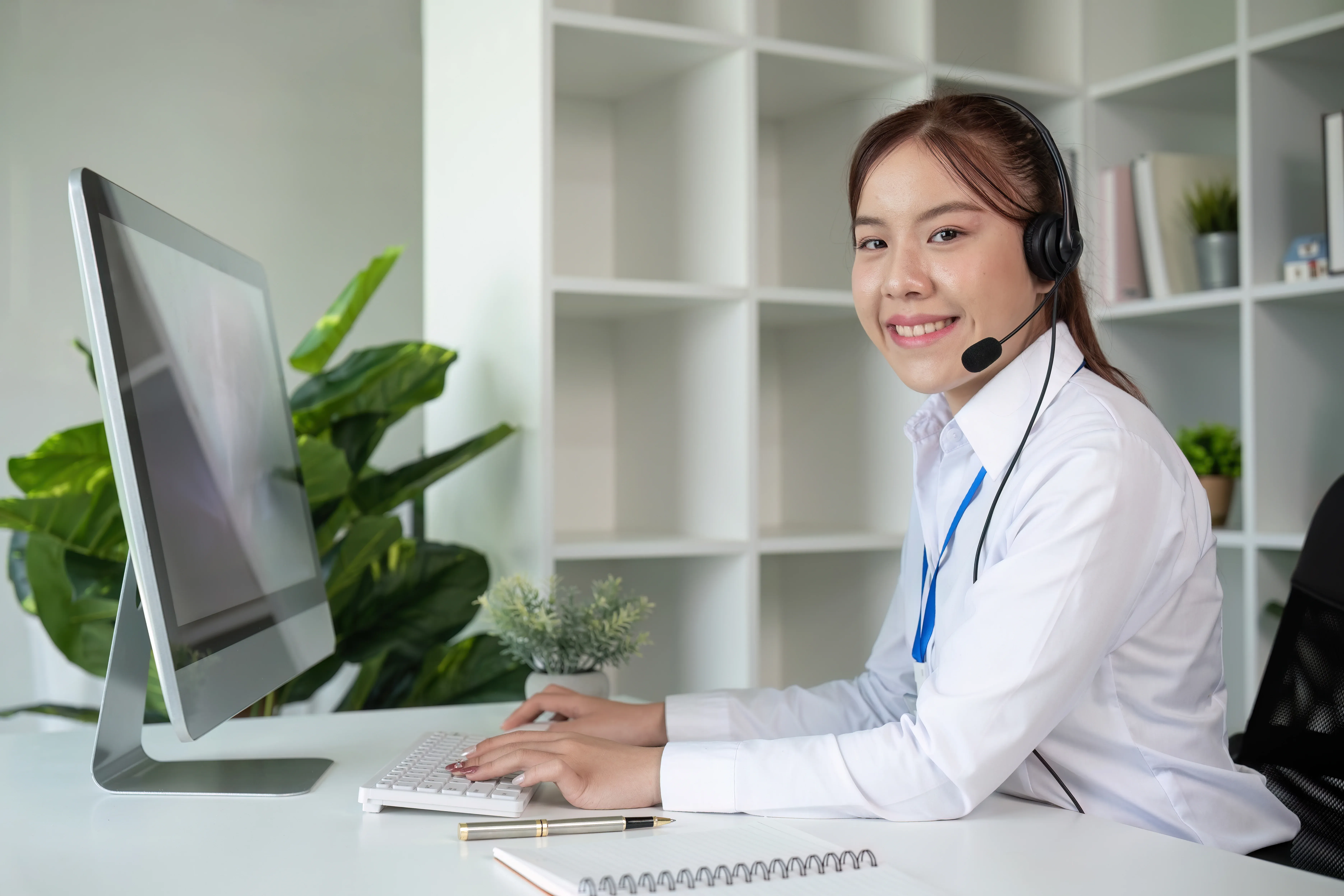call-center-agents-wear-headphones-to-talk-to-cust-2026-01-07-00-50-45-utc.webp