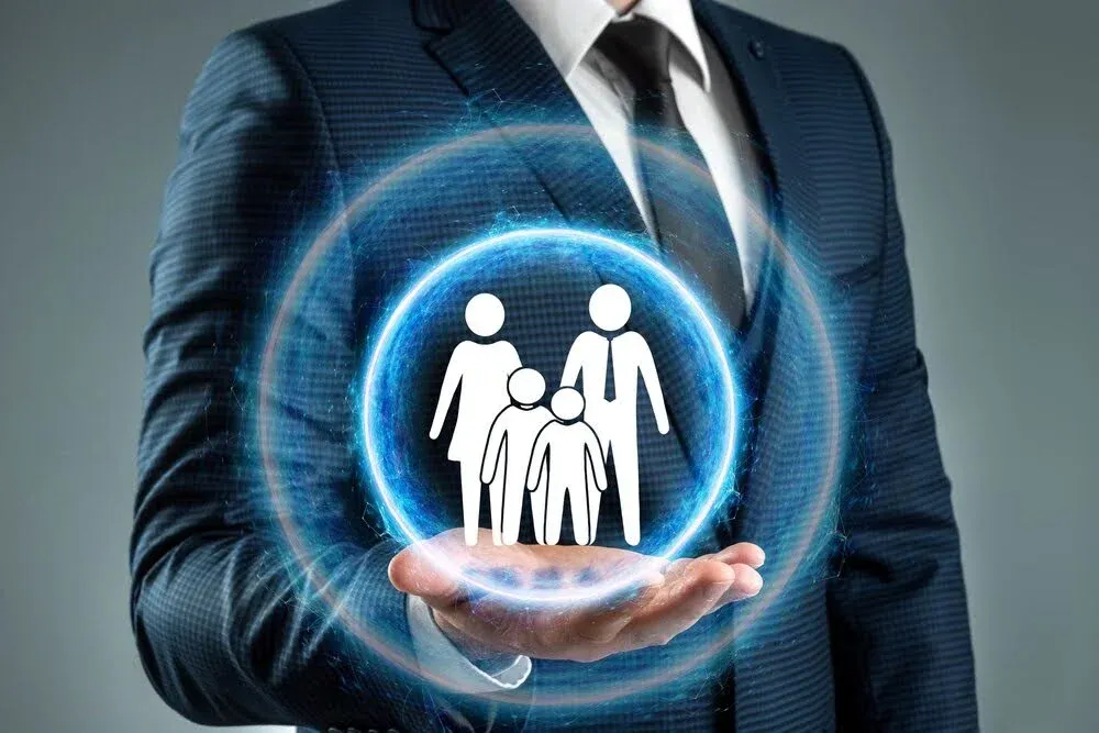 graphic image of person holding a family icon.webp