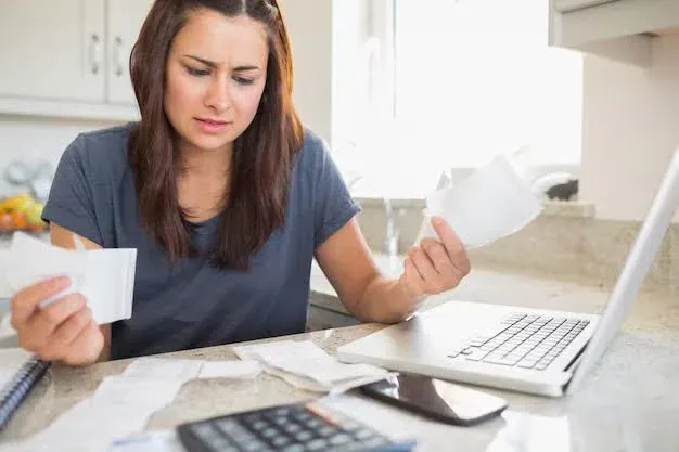 lady stressed looking at medical bills.webp
