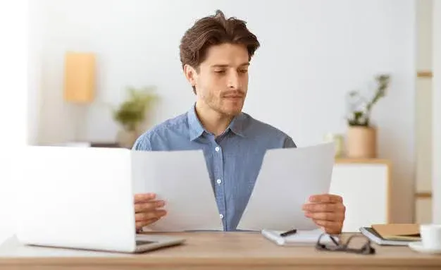 man comparing health insurance plans.webp