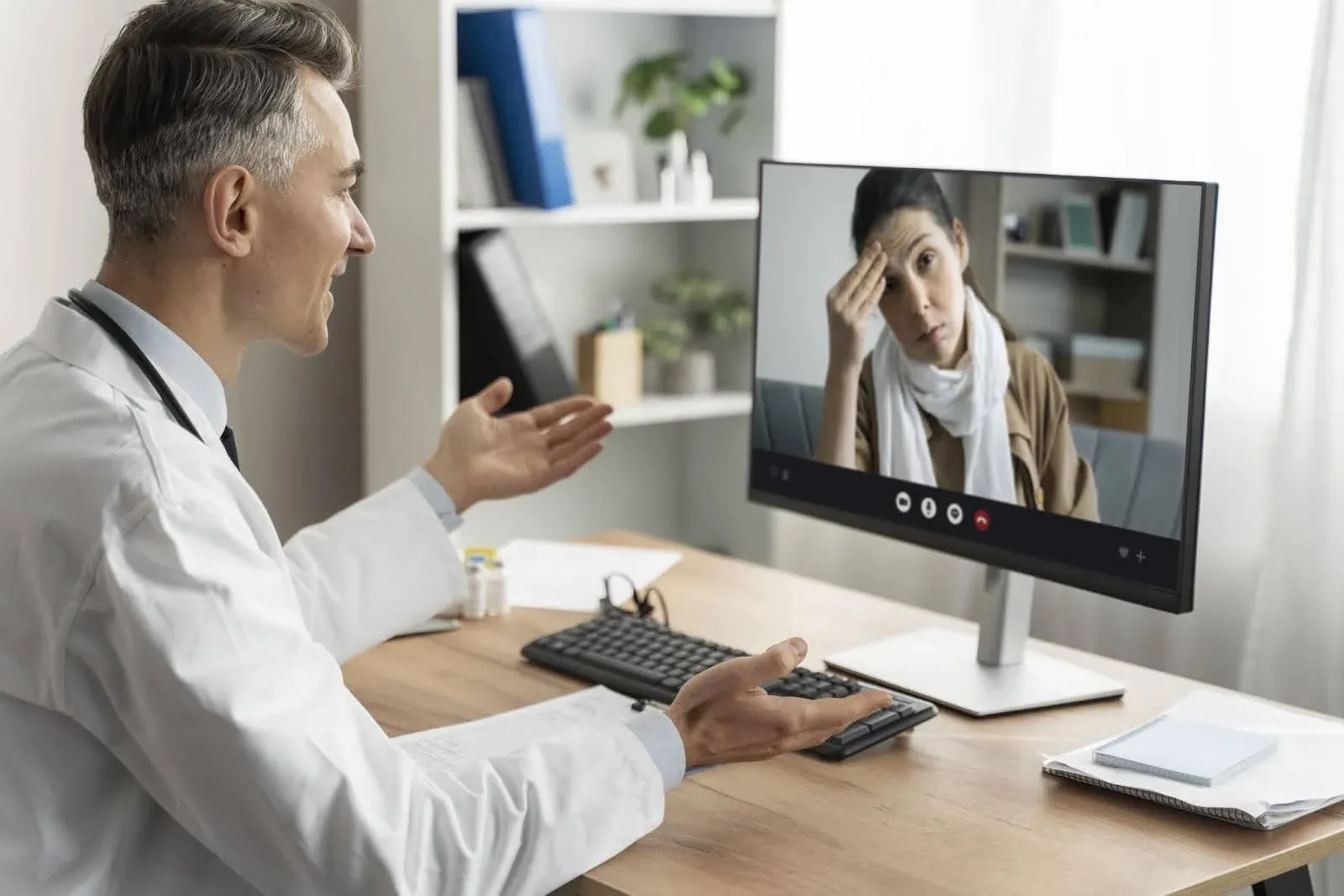 therapist taking an online session with a distressed client.webp